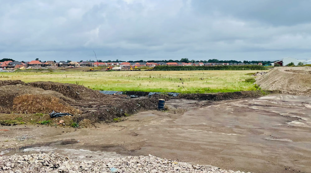 photo showing site with field